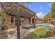Beautiful backyard with a pool, spa, pergola, and desert landscaping, offering a relaxing outdoor oasis at 11274 Felice Cohn Ct, Las Vegas, NV 89179