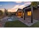 Luxurious backyard featuring a pool, spa, patio, and pergola, creating an ideal space for relaxation and outdoor enjoyment at 11274 Felice Cohn Ct, Las Vegas, NV 89179