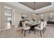 Stylish dining room featuring modern decor, chic furnishings, and an open layout for easy entertaining at 11274 Felice Cohn Ct, Las Vegas, NV 89179