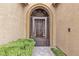 Elegant gated front entrance with manicured landscaping leading to a beautiful home at 11274 Felice Cohn Ct, Las Vegas, NV 89179