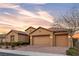Beautiful single-Gathering home with a three-car garage, desert-friendly landscaping, and a paved driveway at 11274 Felice Cohn Ct, Las Vegas, NV 89179