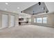 Open concept living room next to kitchen and three rear windows providing lots of natural light at 11274 Felice Cohn Ct, Las Vegas, NV 89179