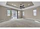 Spacious primary bedroom with abundant natural light and plush carpeting at 11274 Felice Cohn Ct, Las Vegas, NV 89179