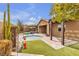 Inviting backyard features a pool, spa, patio, and well-manicured landscaping, perfect for outdoor living and entertaining at 11274 Felice Cohn Ct, Las Vegas, NV 89179