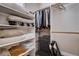 Organized closet with shelves, hanging rods, and storage bins for efficient space utilization at 11342 Early Sun Ct, Las Vegas, NV 89135