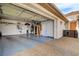 Spacious three car garage with overhead storage and epoxy floors at 11342 Early Sun Ct, Las Vegas, NV 89135