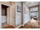 This hallway features wood-look floors and neutral colored walls at 11342 Early Sun Ct, Las Vegas, NV 89135