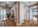 This hallway features wood-look floors and neutral colored walls at 11342 Early Sun Ct, Las Vegas, NV 89135