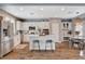 Bright kitchen with stainless steel appliances, a pantry, and a breakfast bar at 11342 Early Sun Ct, Las Vegas, NV 89135