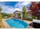 Inviting backyard pool and spa with patio area, perfect for outdoor entertaining at 11342 Early Sun Ct, Las Vegas, NV 89135