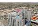 Aerial view of the condo building featuring a rooftop pool, offering luxury amenities and scenic vistas at 150 N Las Vegas Blvd # 818, Las Vegas, NV 89101