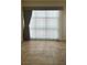 Bright living room featuring sheer curtains and tile flooring at 150 N Las Vegas Blvd # 818, Las Vegas, NV 89101