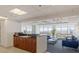 Bright and airy lounge area with kitchenette, city views, and stylish furniture at 150 N Las Vegas Blvd # 818, Las Vegas, NV 89101