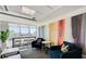 Cozy lounge space with comfortable armchairs, cityscape views, and stylish accents, creating a welcoming and sophisticated atmosphere at 150 N Las Vegas Blvd # 818, Las Vegas, NV 89101
