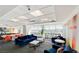 Bright and airy lounge featuring comfortable seating, expansive windows with city views, and stylish décor at 150 N Las Vegas Blvd # 818, Las Vegas, NV 89101