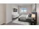 Modern primary bedroom with large window, tv, and a well decorated, comfortable bed at 150 N Las Vegas Blvd # 818, Las Vegas, NV 89101