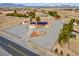 Aerial shot of a home and lot, including outbuildings and desert landscape at 1800 Red Rock Dr, Pahrump, NV 89048