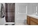 Bathroom featuring a bath/shower combo with gray shower curtain at 1800 Red Rock Dr, Pahrump, NV 89048