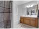 Bathroom featuring a bath/shower combo and neutral-colored shower curtain at 1800 Red Rock Dr, Pahrump, NV 89048