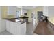 Modern kitchen featuring stainless appliances, bright counters, tile floors and plenty of storage at 1800 Red Rock Dr, Pahrump, NV 89048