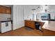 Kitchen with wood cabinets and flooring, pantry and modern sink area at 1800 Red Rock Dr, Pahrump, NV 89048