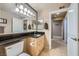 Bathroom featuring a large mirror and cabinet storage at 220 E Flamingo Rd # 402, Las Vegas, NV 89169