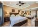 Well lit bedroom with hardwood floors and mirrored closets at 220 E Flamingo Rd # 402, Las Vegas, NV 89169