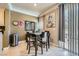 Charming dining area featuring travertine floors, a modern table, and beautiful decor at 220 E Flamingo Rd # 402, Las Vegas, NV 89169