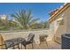Inviting patio space features comfortable seating and views of lush greenery at 220 E Flamingo Rd # 402, Las Vegas, NV 89169