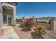Cozy backyard patio with rose bushes, small trees and an in-ground jacuzzi tub at 2288 Red Alder St, Henderson, NV 89002
