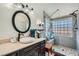Bathroom with a shower and double sinks at 2288 Red Alder St, Henderson, NV 89002