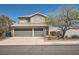Charming two-story home featuring a well-manicured lawn, tiled roof and two-car garage at 2288 Red Alder St, Henderson, NV 89002