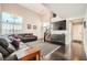 Open living area features soaring ceilings, hardwood flooring, and staircase access at 2288 Red Alder St, Henderson, NV 89002