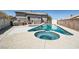 Inviting backyard pool and spa area with a patio, perfect for relaxation and outdoor enjoyment at 2288 Red Alder St, Henderson, NV 89002