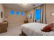 Comfortable bedroom with natural light, stylish decor, and a serene ambiance at 261 Crimson Edge St, Henderson, NV 89012