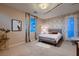Inviting bedroom with soft lighting, stylish decor, and a comfortable bed, creating a relaxing atmosphere at 261 Crimson Edge St, Henderson, NV 89012