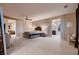 Large bedroom with an ensuite bathroom, seating area and walk-in closets at 261 Crimson Edge St, Henderson, NV 89012