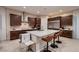 Contemporary kitchen with stainless steel appliances, a large island, and sleek cabinetry at 261 Crimson Edge St, Henderson, NV 89012