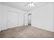 Bedroom with neutral carpet, a closet, and a bright white door at 3021 Lotus Hill Dr, Las Vegas, NV 89134