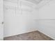 Walk-in closet with built-in shelving and neutral walls at 3021 Lotus Hill Dr, Las Vegas, NV 89134