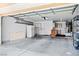 Clean, spacious garage with painted walls and ample storage space at 3021 Lotus Hill Dr, Las Vegas, NV 89134