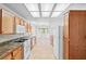 Well-lit kitchen with ample storage, white appliances, and an adjacent breakfast area at 3021 Lotus Hill Dr, Las Vegas, NV 89134