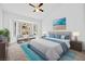 Bright main bedroom with a bay window, featuring plush bedding and stylish décor at 3021 Lotus Hill Dr, Las Vegas, NV 89134