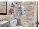 This bathroom features a stylish, tiled walk-in shower and modern fixtures, creating a serene and functional space at 3150 Soft Breezes Dr # 2018, Las Vegas, NV 89128