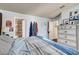 This comfortable bedroom offers a relaxing atmosphere with its soft bedding and convenient access to the bathroom at 3150 Soft Breezes Dr # 2018, Las Vegas, NV 89128