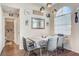Bright dining room with a chandelier and views at 3150 Soft Breezes Dr # 2018, Las Vegas, NV 89128