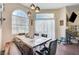 Bright dining room with a modern table and chairs at 3150 Soft Breezes Dr # 2018, Las Vegas, NV 89128