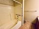 Bathroom featuring a standard tub and shower combination, complemented by tiled floors at 3538 Old Course St, Las Vegas, NV 89122