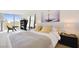 Cozy bedroom with a large bed, city views, and stylish decor at 3726 Las Vegas Blvd # 2605, Las Vegas, NV 89158