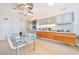 Contemporary kitchen featuring modern appliances, sleek cabinetry, and open dining space at 3726 Las Vegas Blvd # 2605, Las Vegas, NV 89158